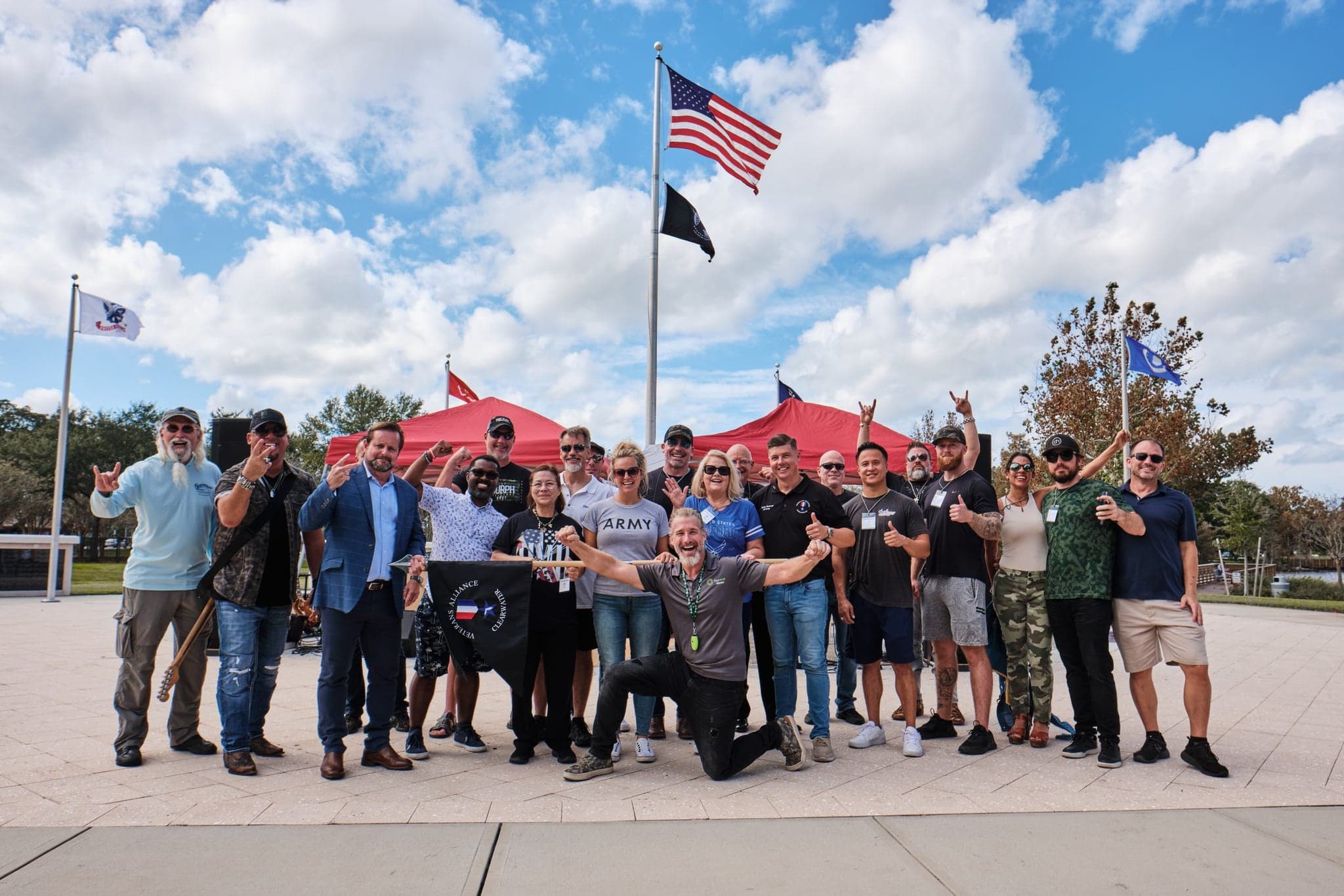 Veterans and community members gathered under American flags at a Florida veterans event